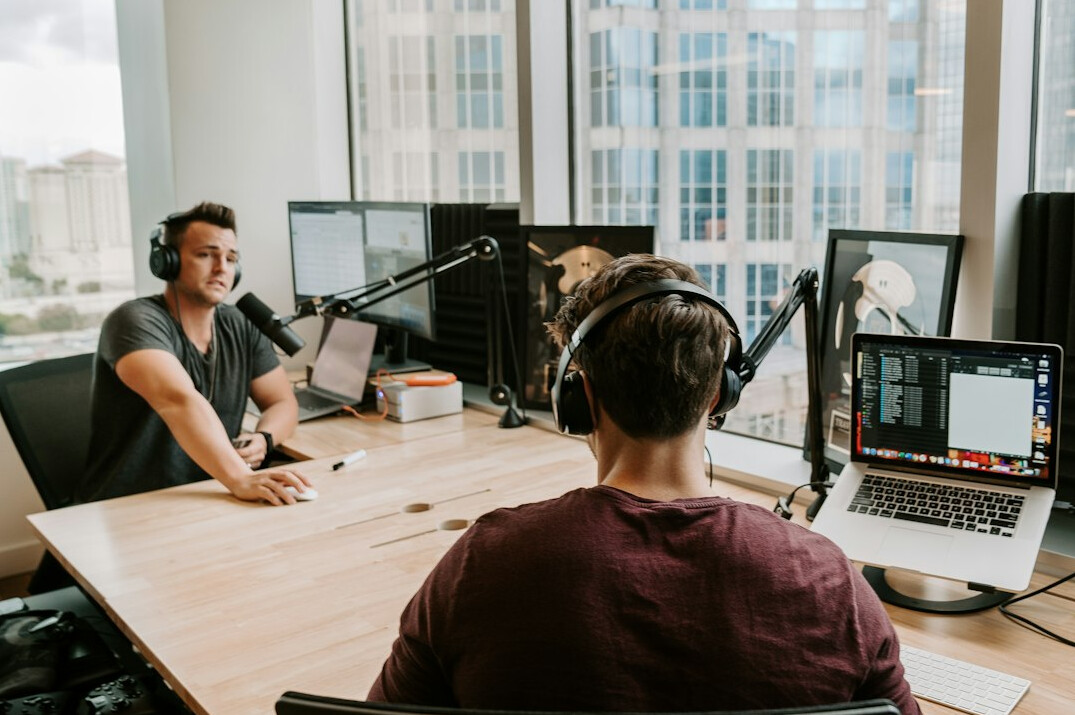two people recording podcast