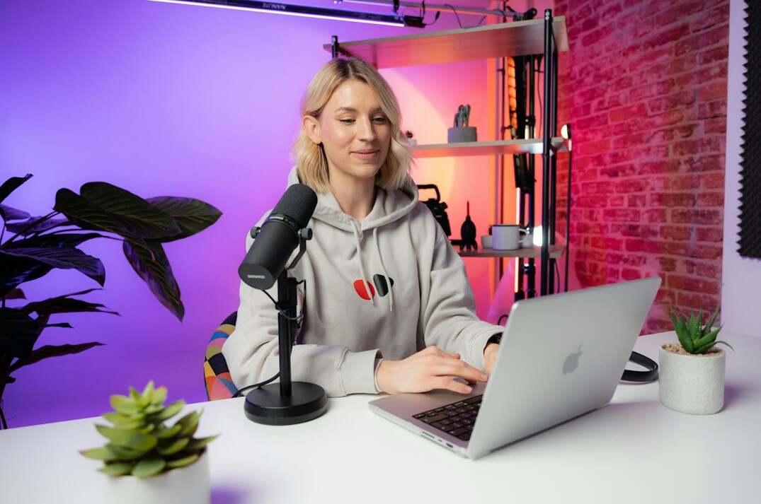 two people in podcast studio